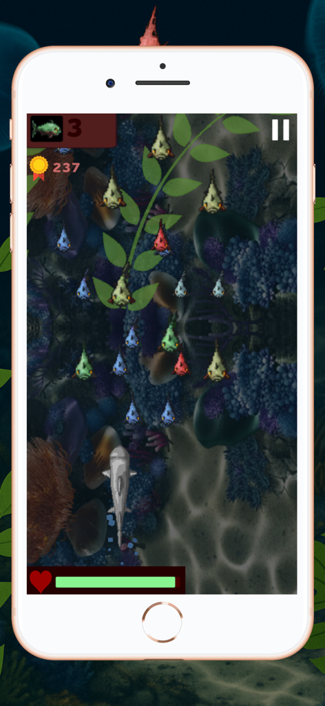 Shark World mobile game screen showing a shark swimming underwater and eating small fish