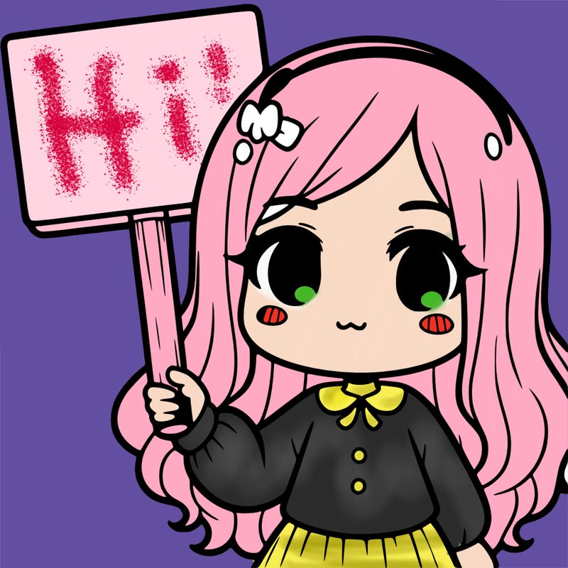 a girl holding a sign