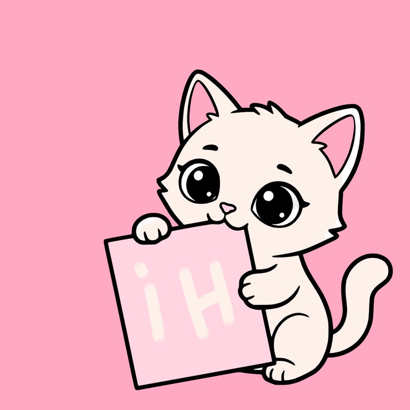 a small cat with a blank sheet of paper in its hand. the cat is sooooooo cute!
