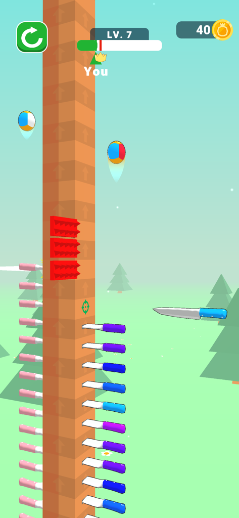 Ball Up: Knife Racing - Gameplay screenshot of Ball Up Knife Racing showing a ball bouncing on colorful knives up a tower