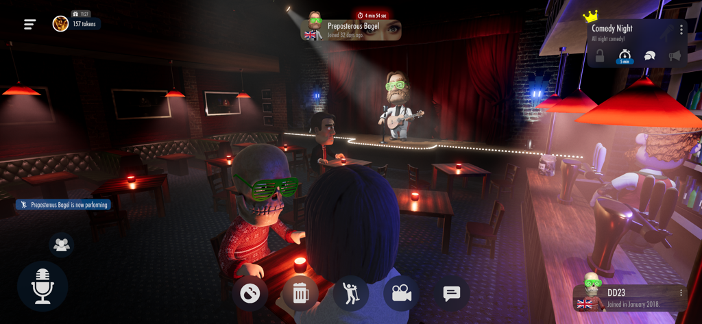 Comedy Night - The Voice Game - An avatar performing on a spotlighted stage in a virtual comedy club with audience members watching