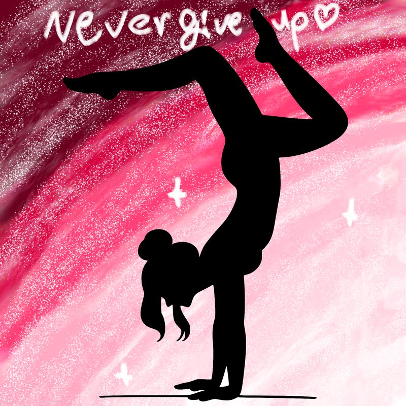 a woman doing a handstand