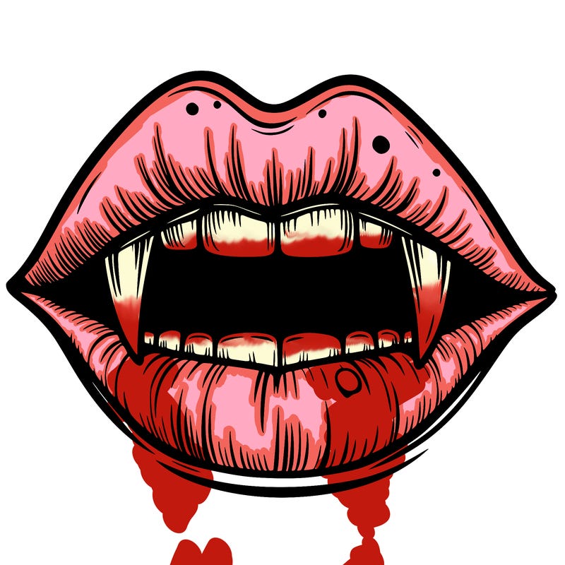lips with vampire teeth