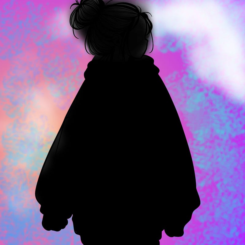 realistic girl with a oversized sweatshirt on and a bun