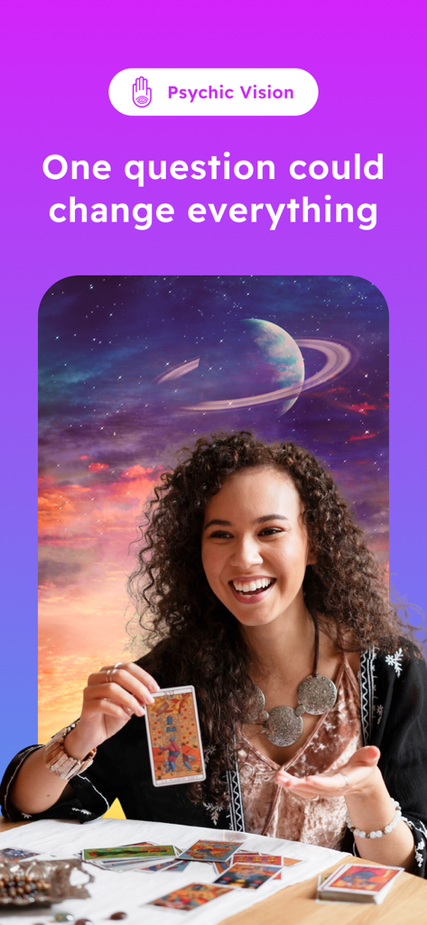 A smiling psychic advisor holding a tarot card in front of a cosmic sky background