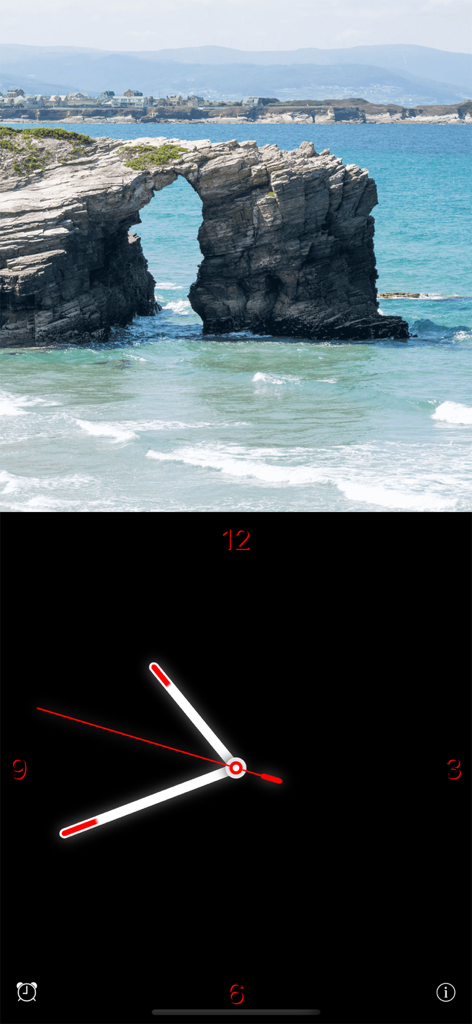 Standby Alarm Clock - Analog clock with red numbers and a landscape photo background