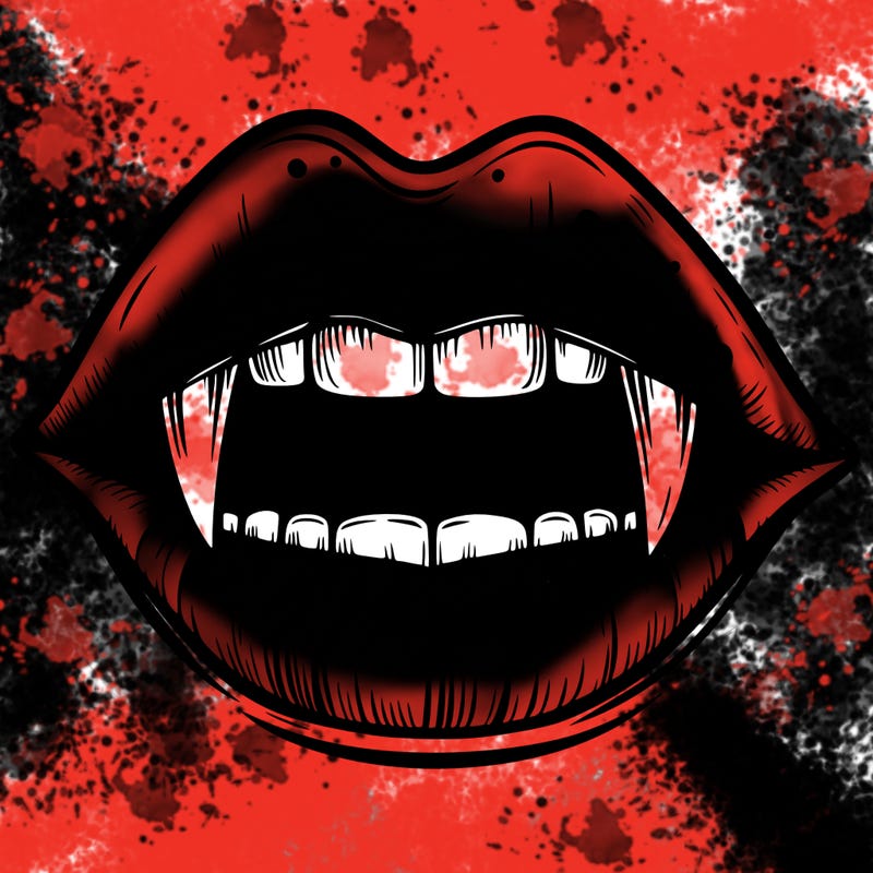 lips with vampire teeth