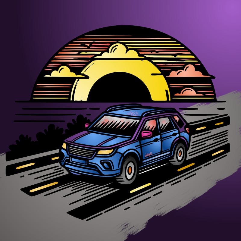 a car driving along the sunset