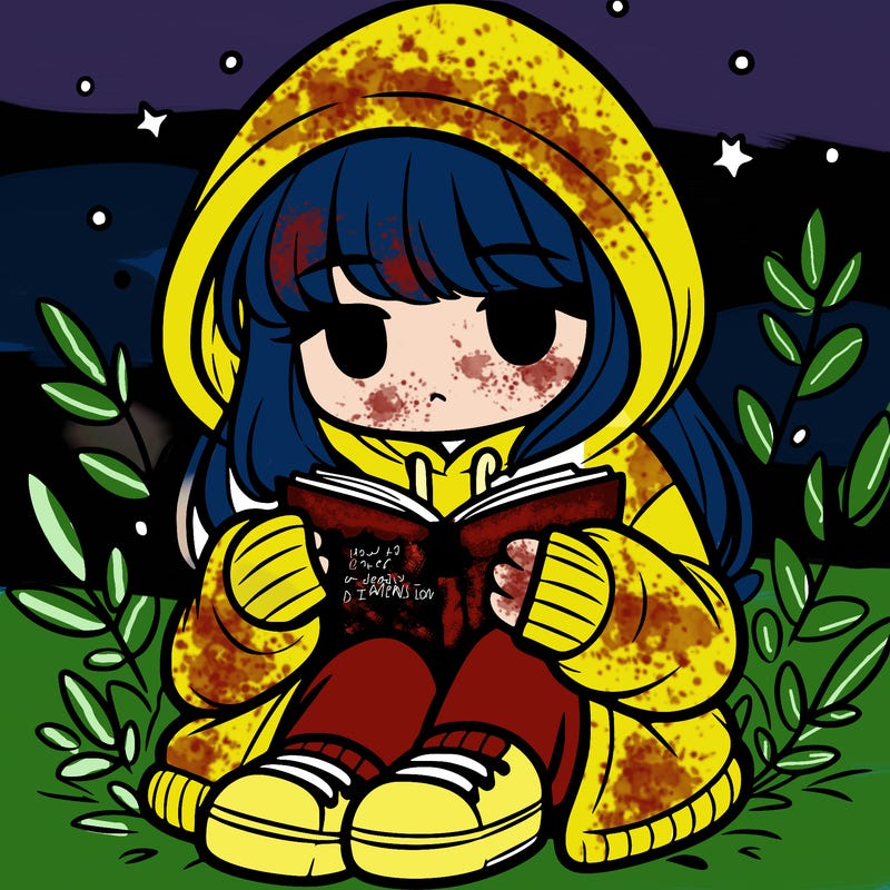 girl in oversized hoodie reading a book