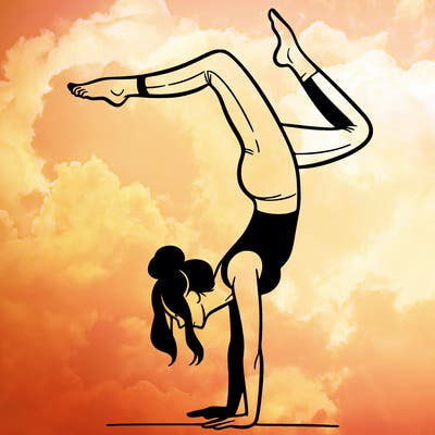 a woman doing a handstand
