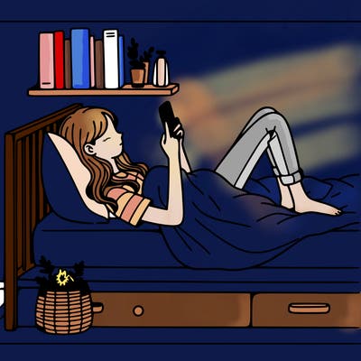 a girl laying on her bed with her phone