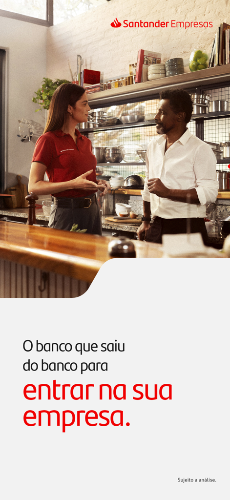 Representante de Santander hablando con un dueño de negocio en una cocina para la app Santander Empresas.