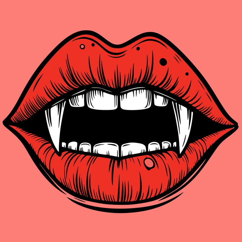 lips with vampire teeth
