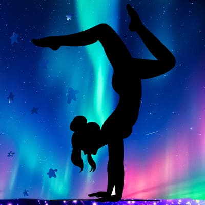 a woman doing a handstand