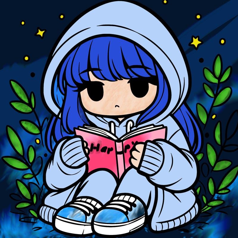 girl in oversized hoodie reading a book