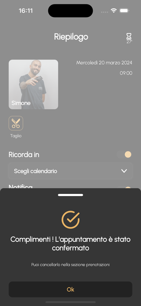 Bildschirm einer mobilen App, der eine erfolgreiche Terminbestätigung für einen Haarschnitt im Andrew Barbershop zeigt
