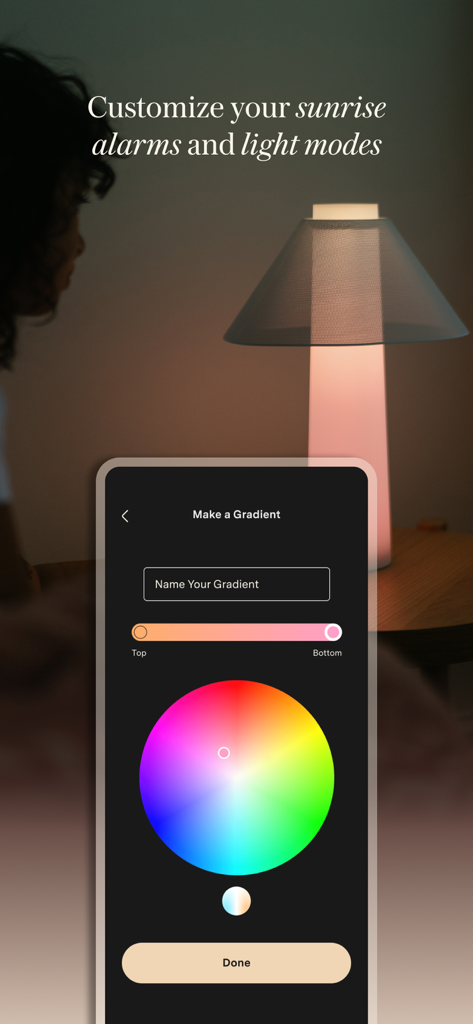 Loftie - A smartphone interface showing a color wheel to customize light gradients and sunrise alarms for the Loftie lamp.