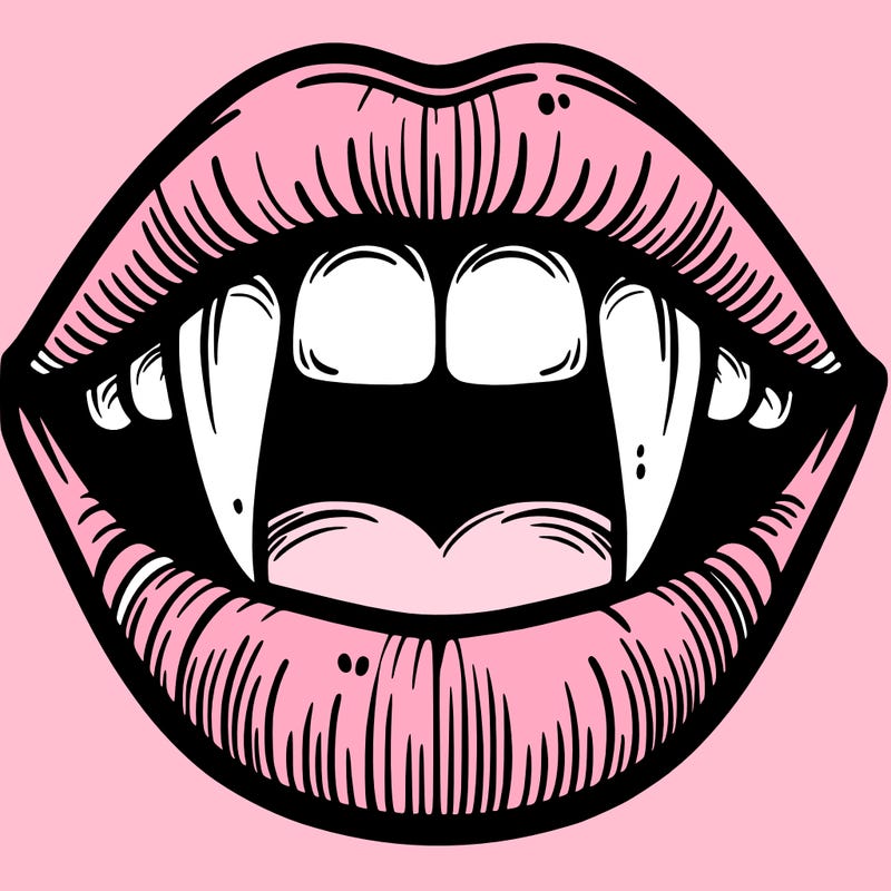 lips with vampire teeth