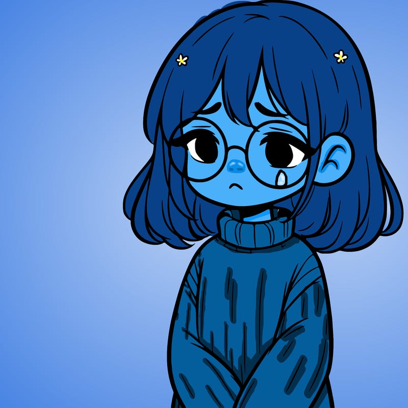 sad girl with glasses in a sweater