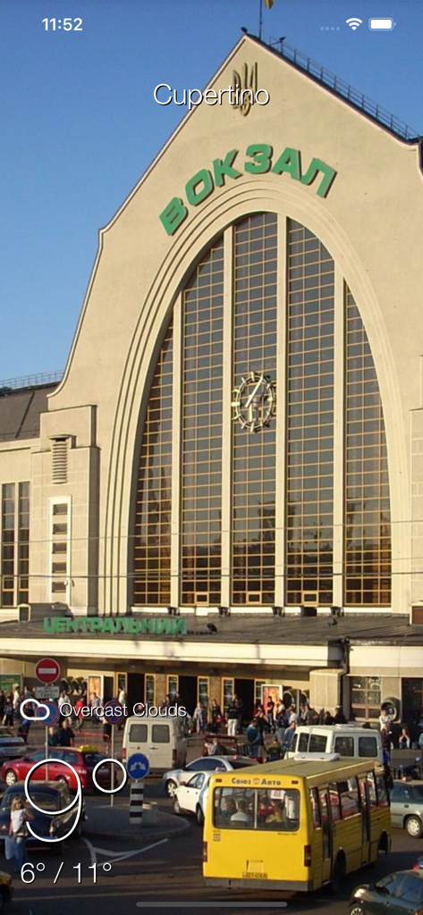 Local Meteo - weather live - Local Meteo app displaying current weather conditions over a background image of the Kyiv Central Railway Station in Ukraine