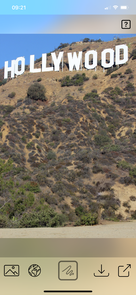 Magic Photo Eraser - Magic Photo Eraser app interface featuring a landscape photo of the Hollywood sign in Los Angeles