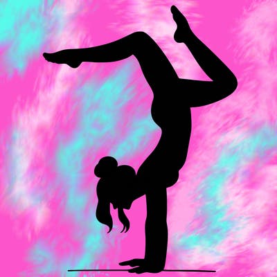 a woman doing a handstand