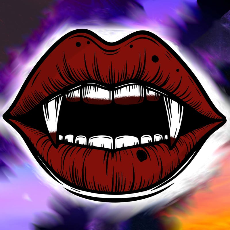 lips with vampire teeth