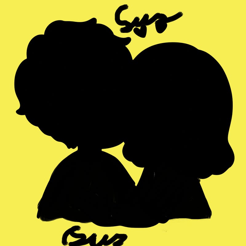 a boy kissing a girl