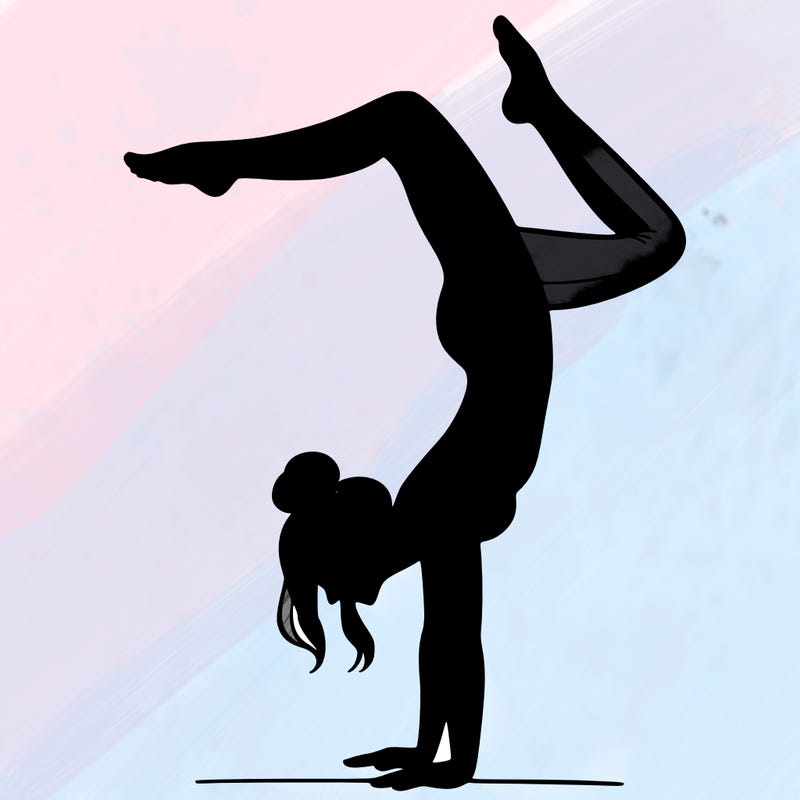 a woman doing a handstand
