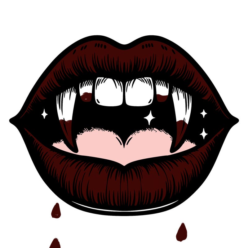 lips with vampire teeth
