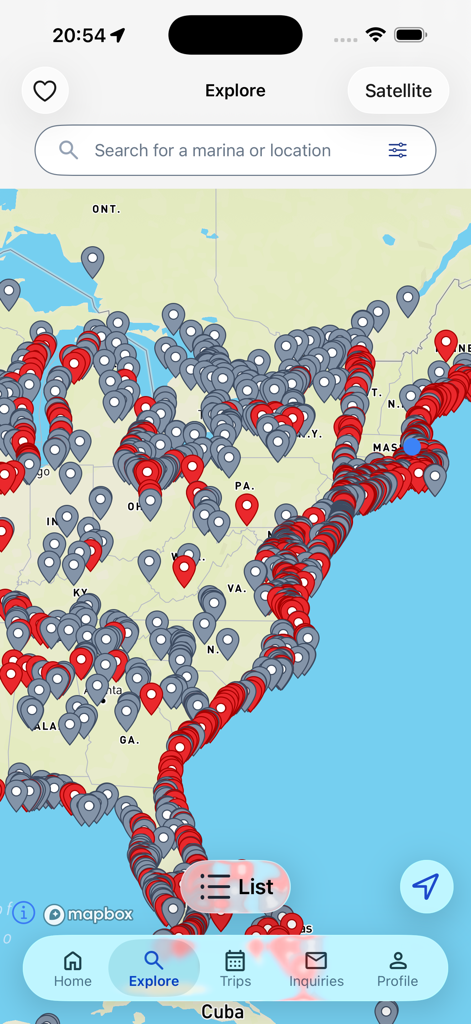 Map view of the Dockwa app showing numerous marina and boatyard locations along the Eastern United States coastline and Great Lakes.