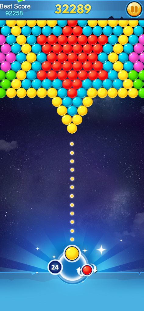 Bubble Shooter Classic Puzzle - Pantalla de juego de Bubble Shooter Classic Puzzle que muestra burbujas de colores y una línea de puntería punteada contra un cielo estrellado