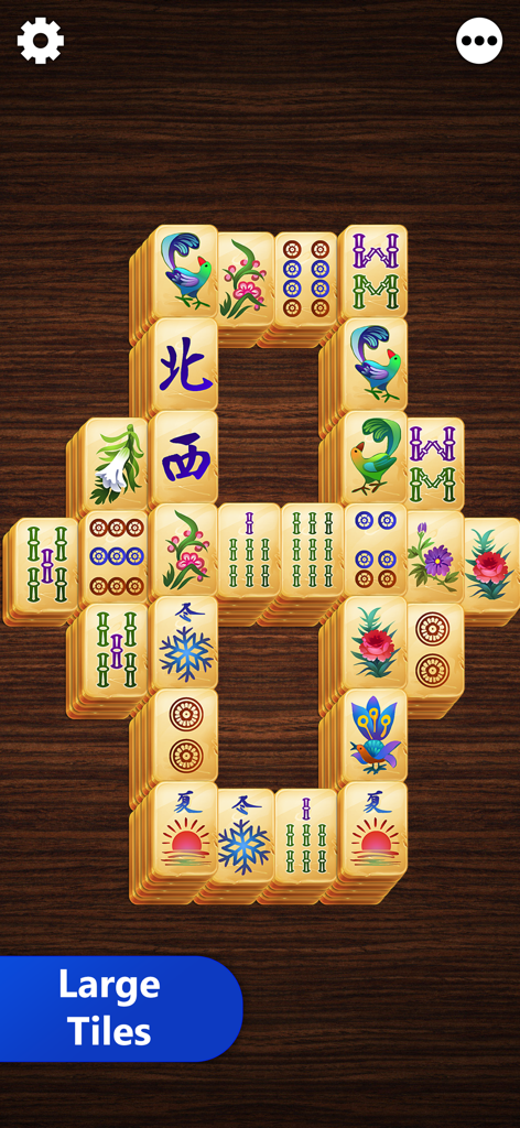 Mahjong Titan - Mahjong Titan gameplay showing large high quality tiles on a classic wooden background
