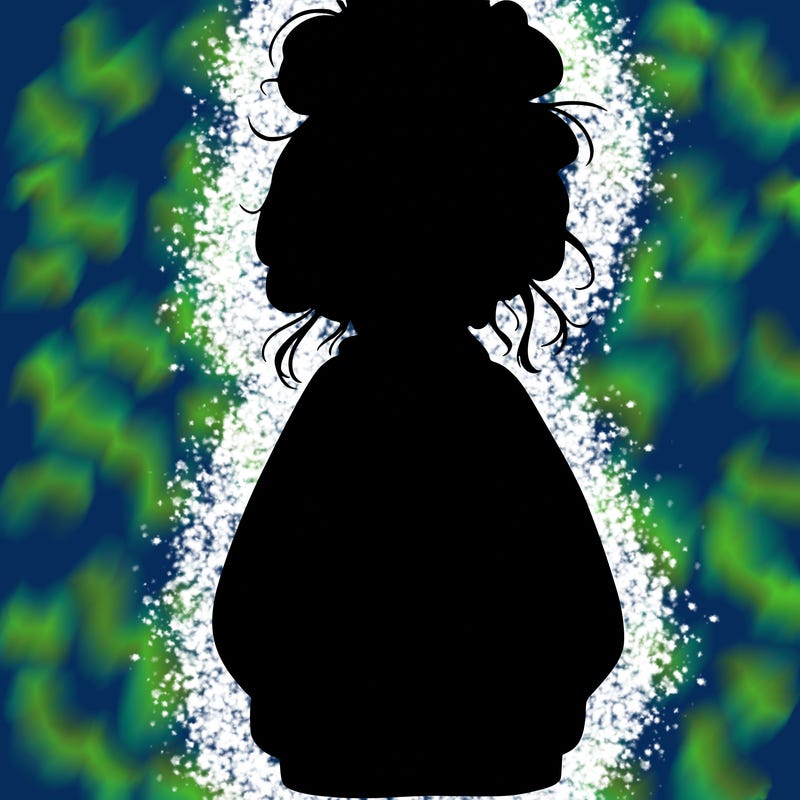 girl with baggy sweatshirt and messy bun