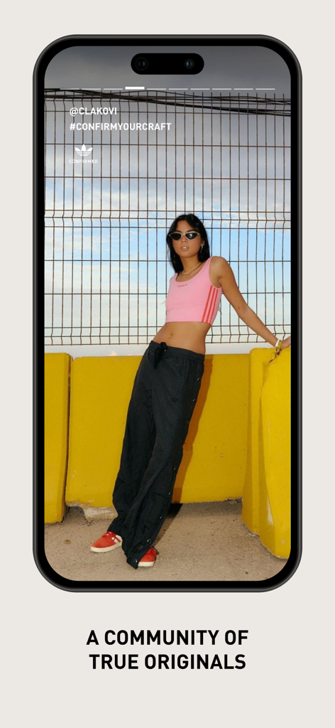CONFIRMED | Sneakers & more - A young woman in urban streetwear posing against a yellow wall for the Adidas Confirmed app