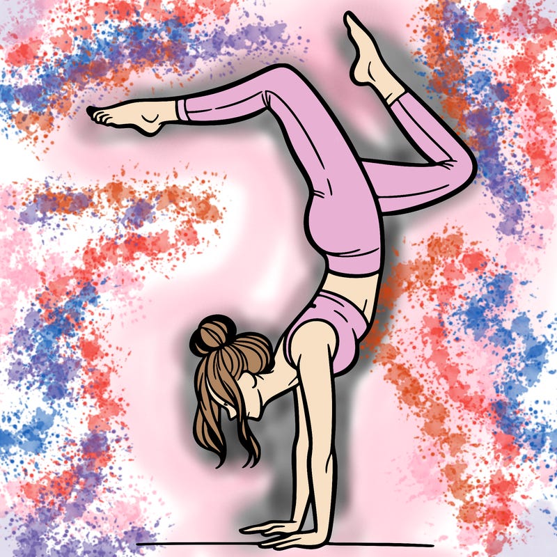 a woman doing a handstand