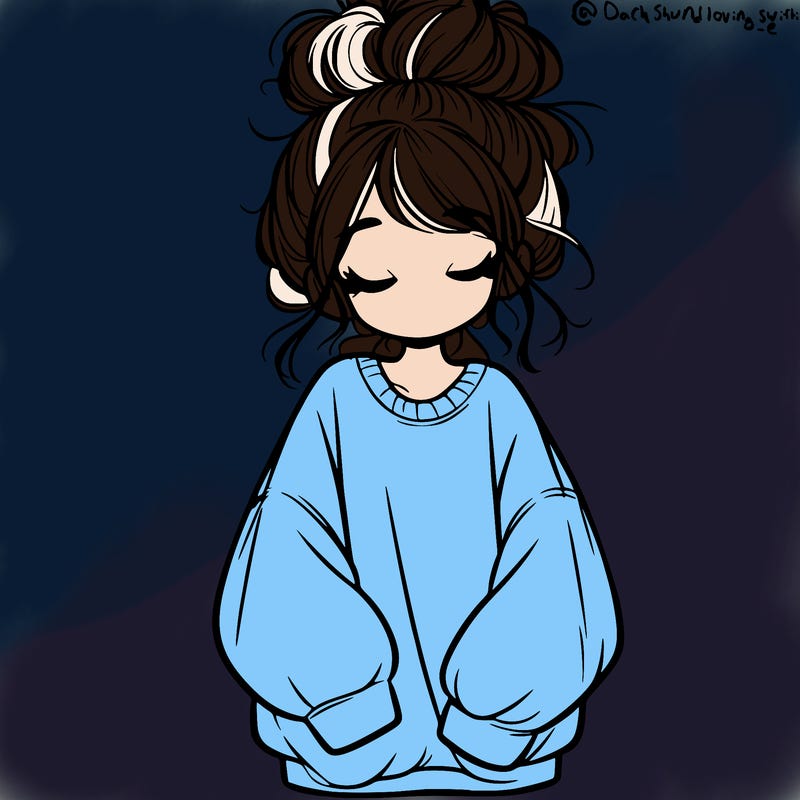 girl with baggy sweatshirt and messy bun