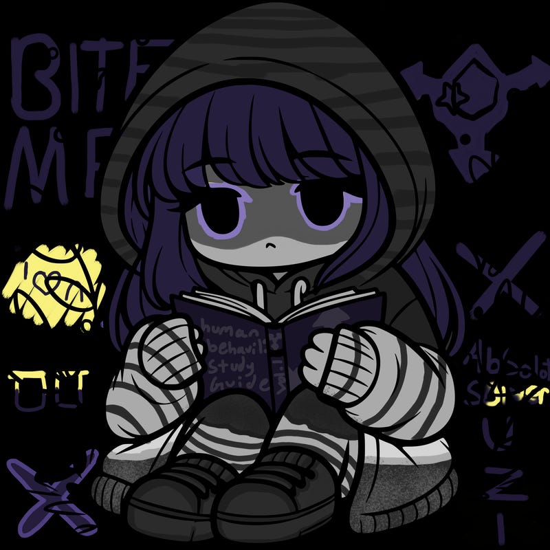 girl in oversized hoodie reading a book