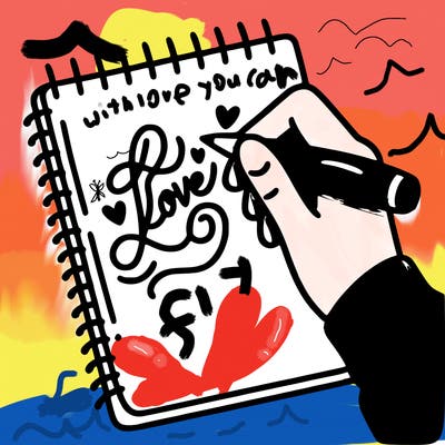 a hand writing “love” in calligraphy on a notebook