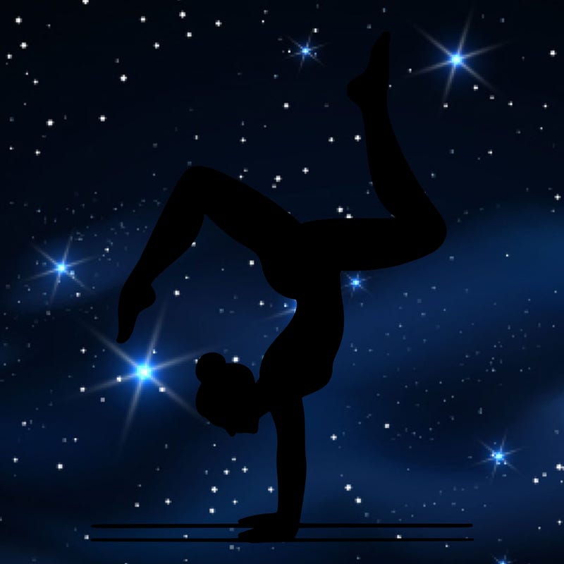 a woman doing a handstand