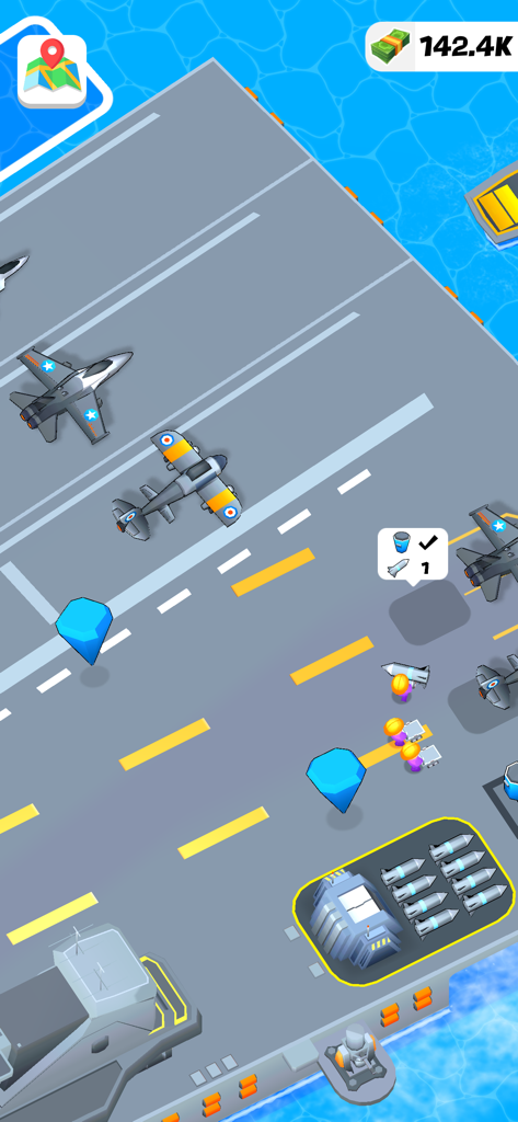 Idle Aircraft Carrier - Top down view of fighter jets and crew members on an aircraft carrier deck in a mobile game