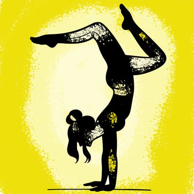 a woman doing a handstand