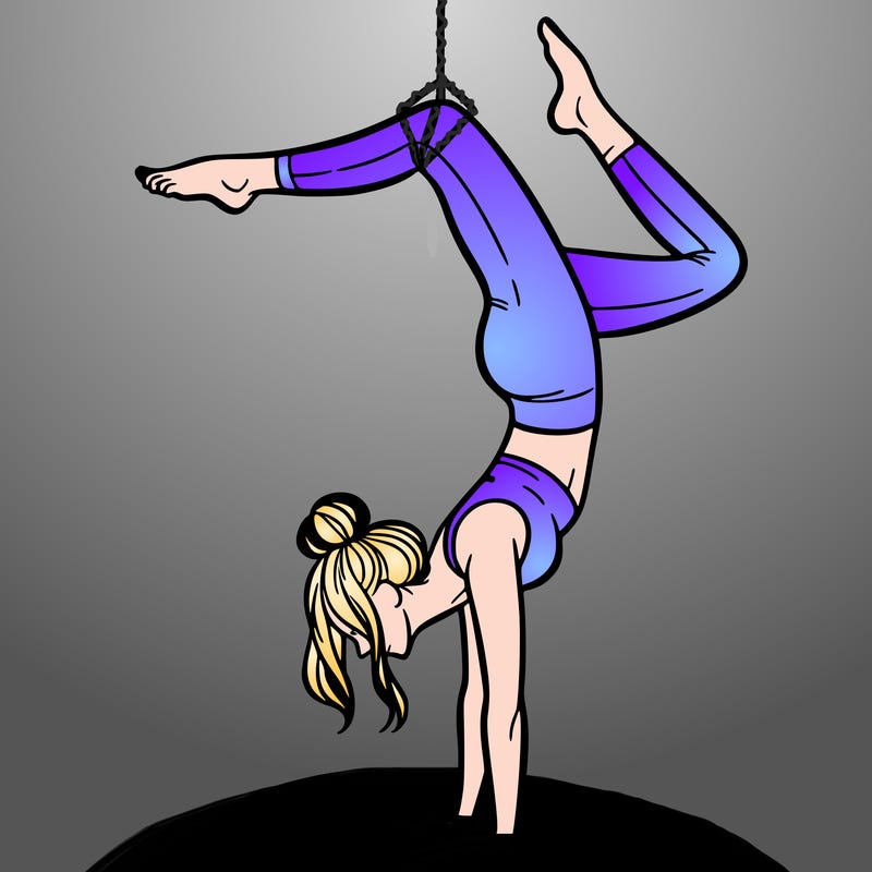 a woman doing a handstand