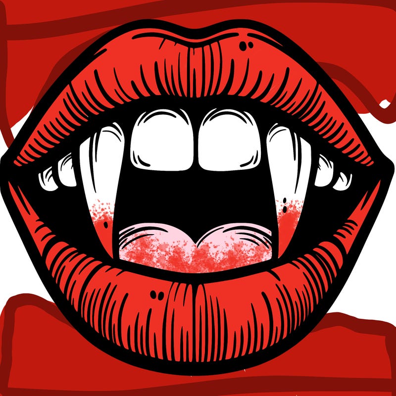 lips with vampire teeth