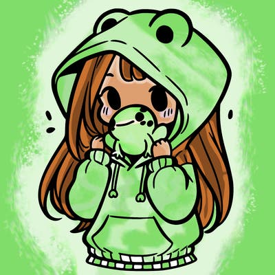 a girl holding a froggy hoodie