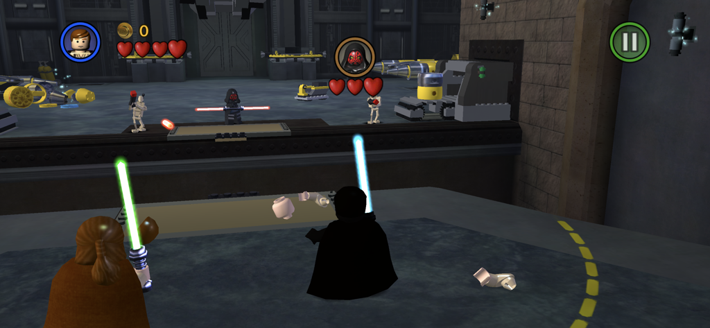 Gameplay di LEGO Star Wars The Complete Saga con una battaglia contro Darth Maul con spade laser