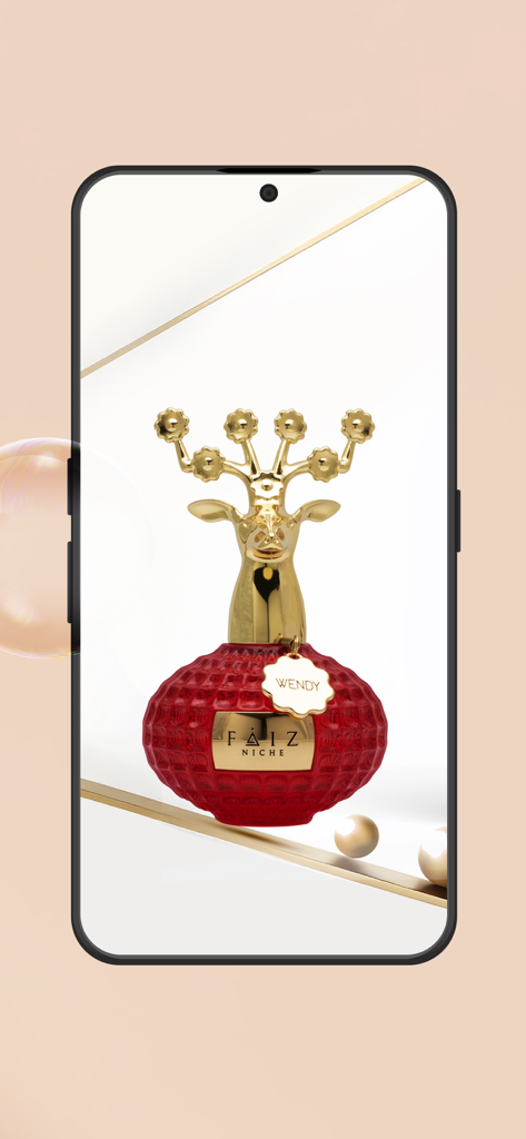 V Perfumes:Buy Perfumes Online - A luxury red perfume bottle by Faiz Niche with a golden deer head cap displayed on a smartphone screen.