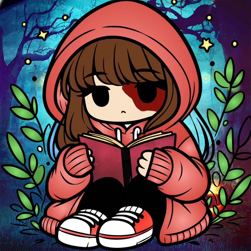 girl in oversized hoodie reading a book