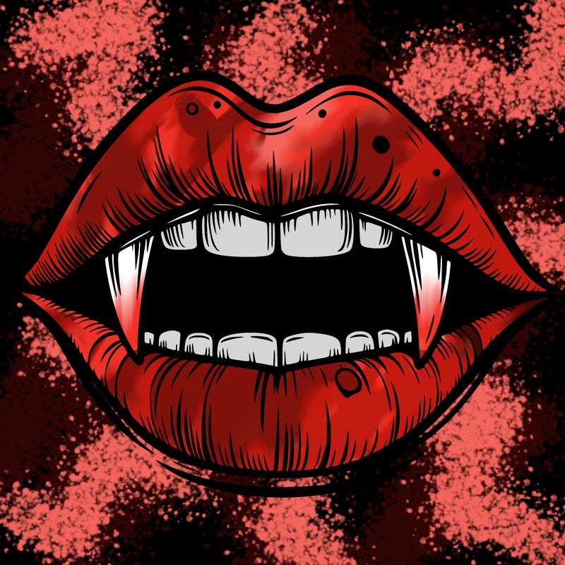 lips with vampire teeth