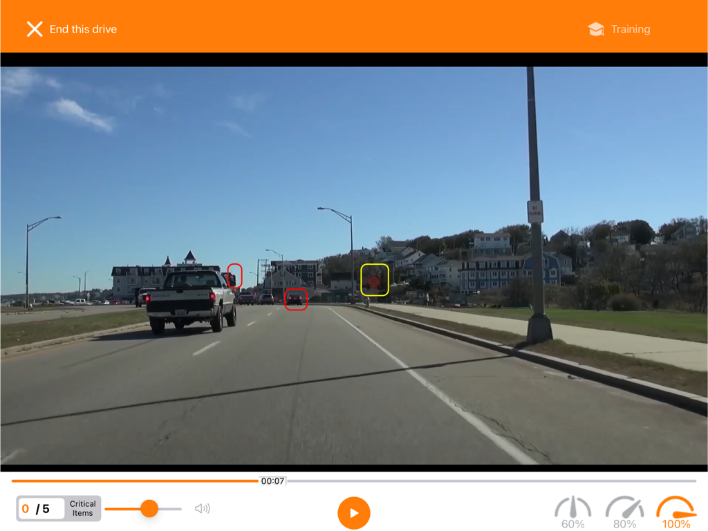 DriveFocus 2.0 - Interactive road hazard perception training video within the DriveFocus app showing highlighted vehicles and signs